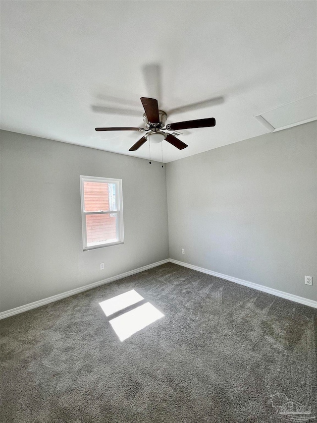 carpeted empty room with ceiling fan