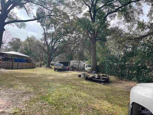 view of yard featuring fence