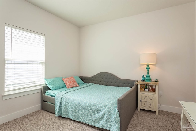 3564 Sailfish Dr, Gulf Breeze, FL 32563 - carpeted bedroom featuring baseboards