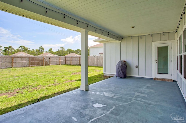 3564 Sailfish Dr, Gulf Breeze, FL 32563 - fenced backyard featuring a patio and a grill