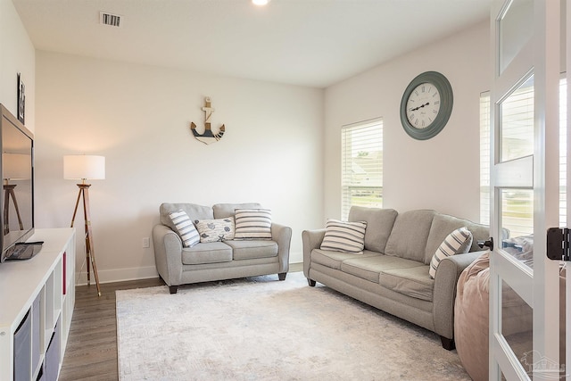 3564 Sailfish Dr, Gulf Breeze, FL 32563 - living area featuring wood finished floors and baseboards