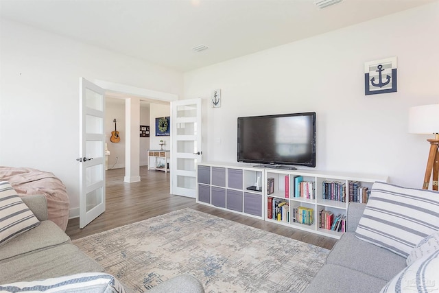3564 Sailfish Dr, Gulf Breeze, FL 32563 - living room featuring french doors and wood finished floors