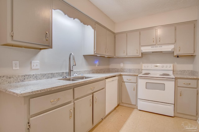 4117 Pace Ln, Pace, FL 32571 - kitchen with white appliances, under cabinet range hood, light countertops, and a textured ceiling