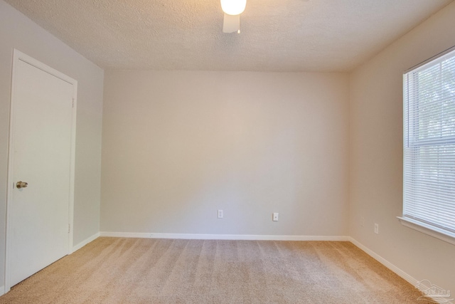 4117 Pace Ln, Pace, FL 32571 - unfurnished room featuring light carpet and a textured ceiling