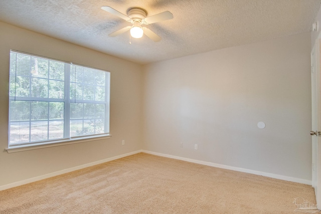 4117 Pace Ln, Pace, FL 32571 - unfurnished room featuring light colored carpet, ceiling fan, and a textured ceiling