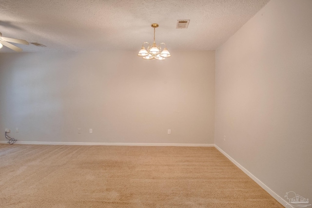 4117 Pace Ln, Pace, FL 32571 - spare room with ceiling fan, light carpet, a chandelier, and a textured ceiling