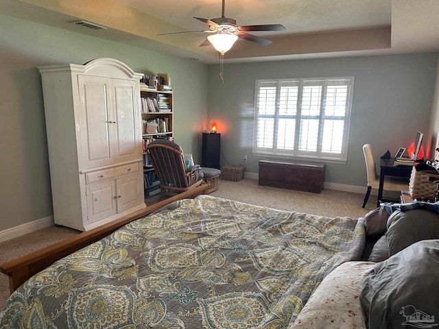 bedroom featuring baseboards, carpet flooring, and ceiling fan