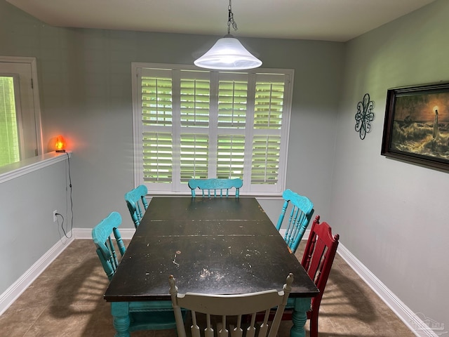dining room with baseboards