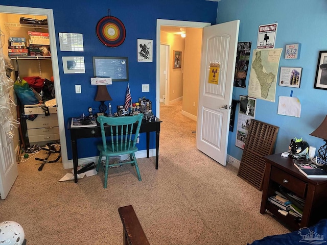 office with carpet flooring and baseboards