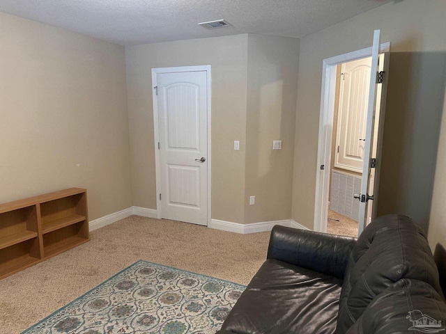 bedroom with carpet and baseboards