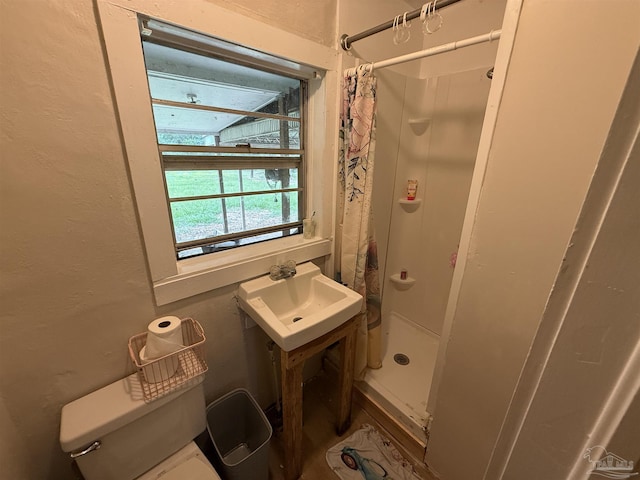 1159 Twin Bridges Rd, Flomaton, AL 36441 - bathroom featuring a stall shower and a textured wall