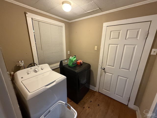 1159 Twin Bridges Rd, Flomaton, AL 36441 - laundry room featuring washer and dryer, wood finished floors, and ornamental molding