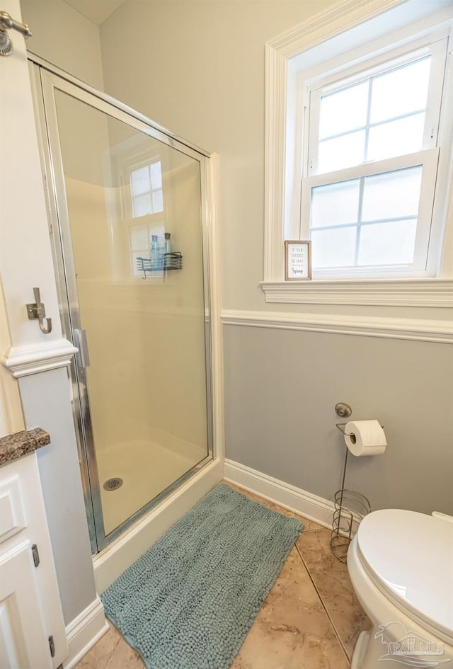 5013 Roland Rd, Pace, FL 32571 - full bathroom featuring a stall shower and toilet