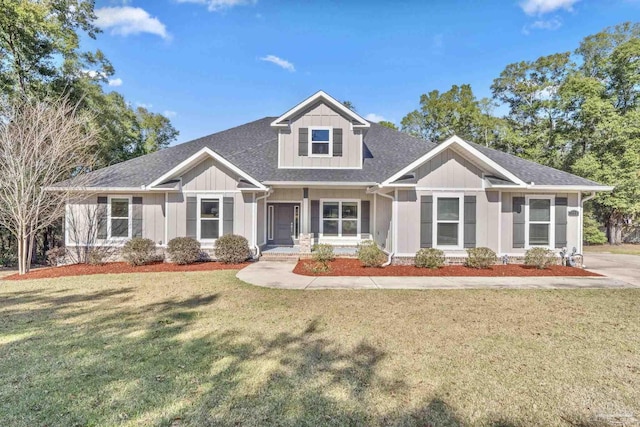 craftsman-style home featuring a front yard