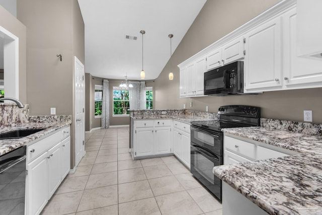 kitchen featuring a sink, visible vents, white cabinets, and black appliances