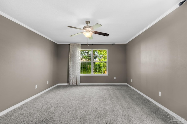 unfurnished room featuring baseboards, a ceiling fan, crown molding, and carpet floors