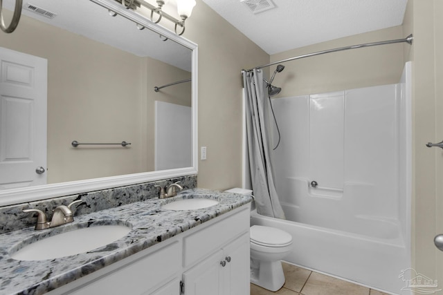 bathroom with visible vents, a sink, and toilet