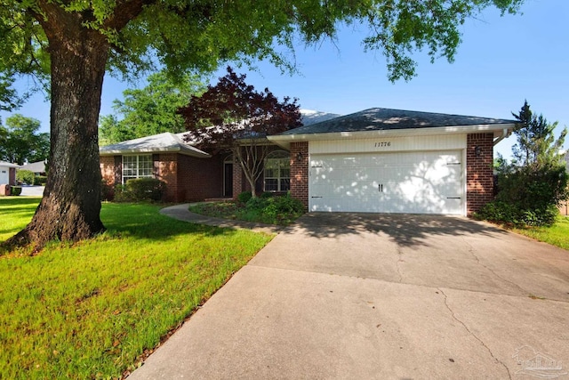 single story home with brick siding, driveway, an attached garage, and a front lawn
