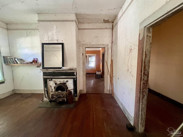 corridor featuring hardwood / wood-style floors