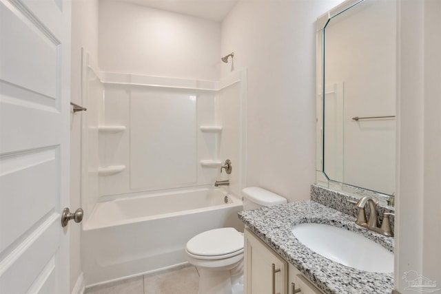 full bathroom featuring vanity, tile patterned floors, washtub / shower combination, and toilet