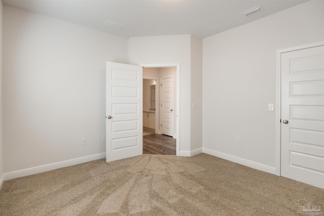 unfurnished bedroom with carpet