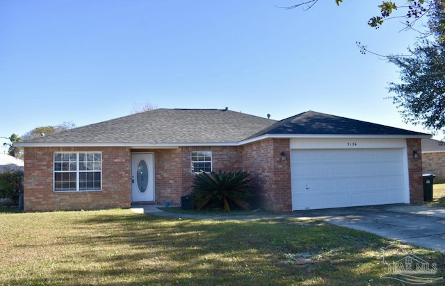 ranch-style house with a front yard and a garage