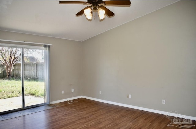 empty room featuring hardwood / wood-style flooring and ceiling fan