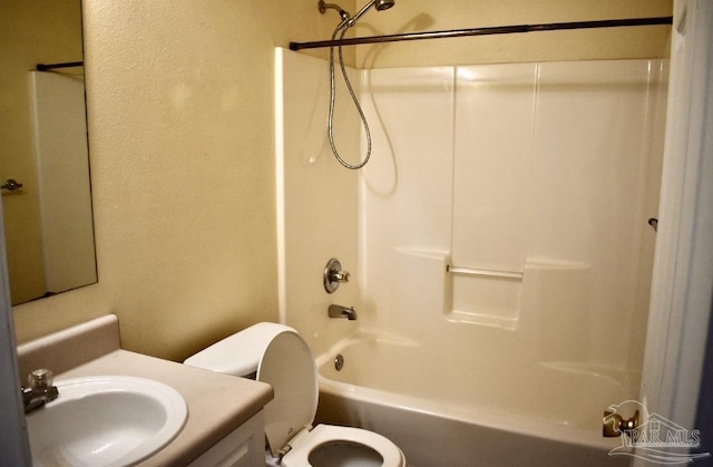 full bathroom featuring vanity, shower / bathtub combination, and toilet