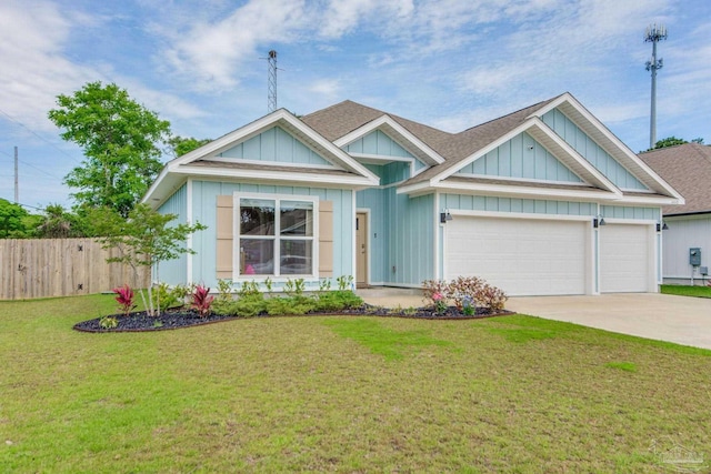 view of front facade with a front lawn and a garage