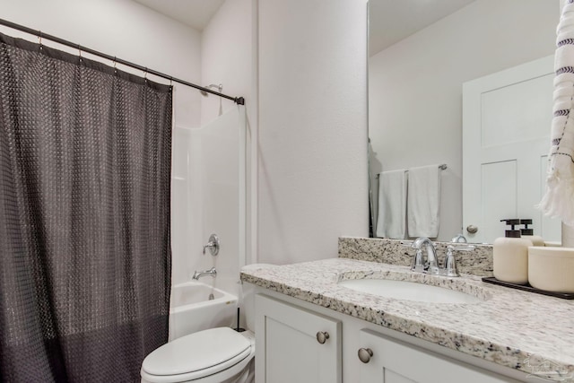 full bathroom with vanity, toilet, and shower / bath combo