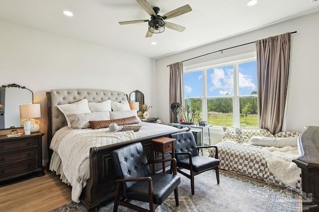 7664 Buffalo Ridge Rd, Pace, FL 32571 - bedroom featuring recessed lighting, wood finished floors, and a ceiling fan