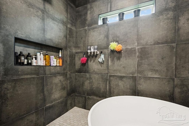 7664 Buffalo Ridge Rd, Pace, FL 32571 - bathroom with a freestanding tub