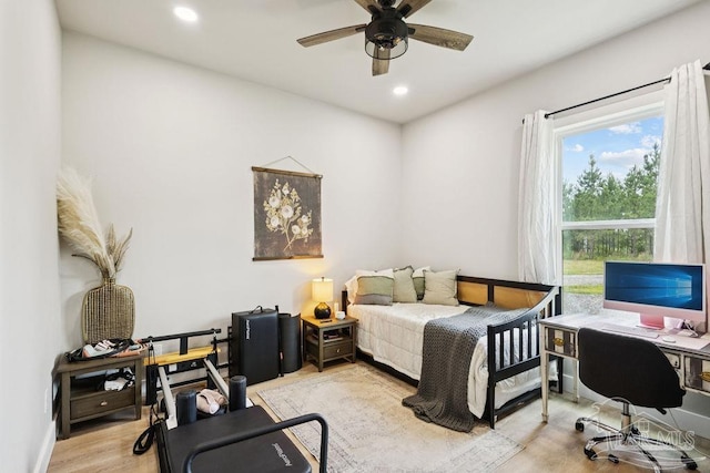 7664 Buffalo Ridge Rd, Pace, FL 32571 - bedroom with a desk, light wood-style flooring, recessed lighting, and ceiling fan