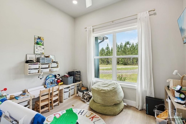 7664 Buffalo Ridge Rd, Pace, FL 32571 - playroom featuring healthy amount of natural light and wood finished floors