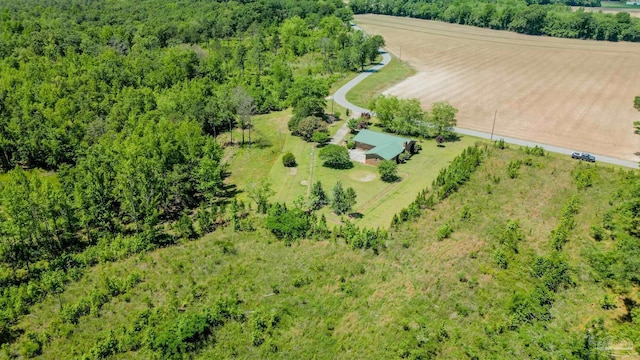 birds eye view of property featuring a rural view