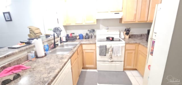 kitchen with light tile patterned flooring, white appliances, sink, and light brown cabinets