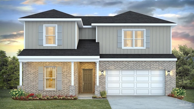 1674 Amaya Ln, Gulf Breeze, FL 32563 - view of front of property with brick siding, concrete driveway, a garage, board and batten siding, and a shingled roof