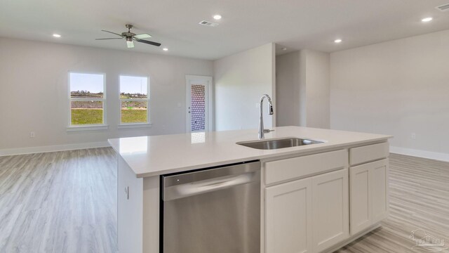 1674 Amaya Ln, Gulf Breeze, FL 32563 - kitchen with dishwasher, a sink, open floor plan, light wood-type flooring, and recessed lighting