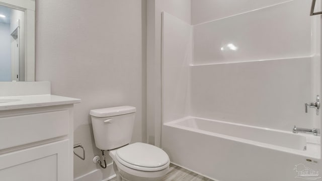 1674 Amaya Ln, Gulf Breeze, FL 32563 - full bathroom featuring vanity, toilet,  shower combination, and baseboards