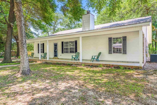 9001 Thompson Dr, Pensacola, FL 32534 - single story home featuring covered porch and a chimney