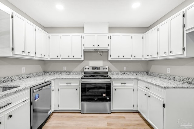 9001 Thompson Dr, Pensacola, FL 32534 - kitchen featuring appliances with stainless steel finishes, recessed lighting, and white cabinets