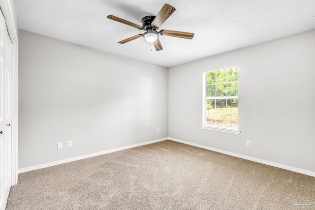 9001 Thompson Dr, Pensacola, FL 32534 - unfurnished room featuring carpet floors, baseboards, and a ceiling fan