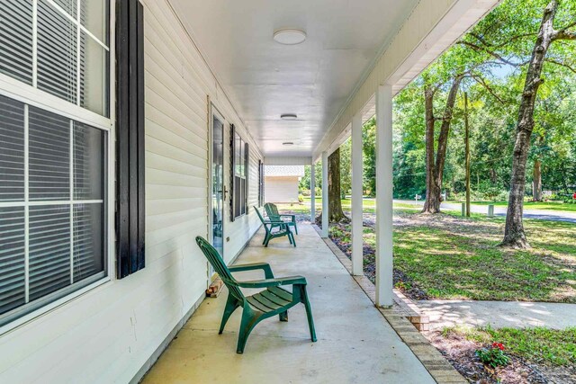 9001 Thompson Dr, Pensacola, FL 32534 - view of patio with a porch