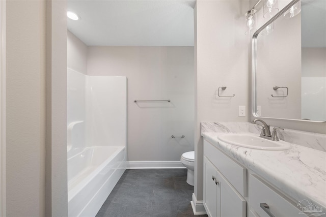 bathroom featuring tub / shower combination, baseboards, toilet, and vanity
