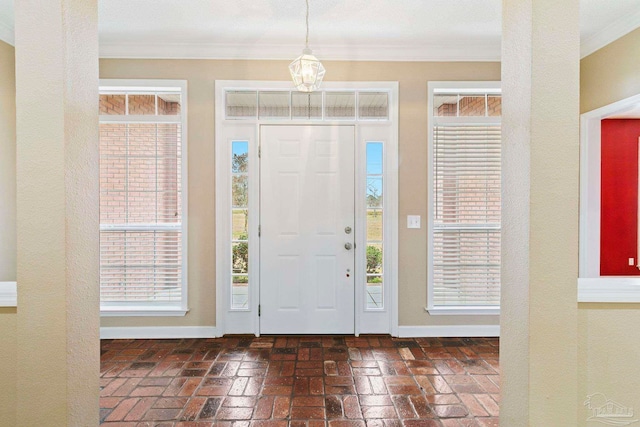 foyer entrance with ornamental molding