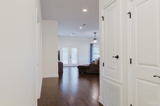 hall featuring french doors and dark hardwood / wood-style flooring