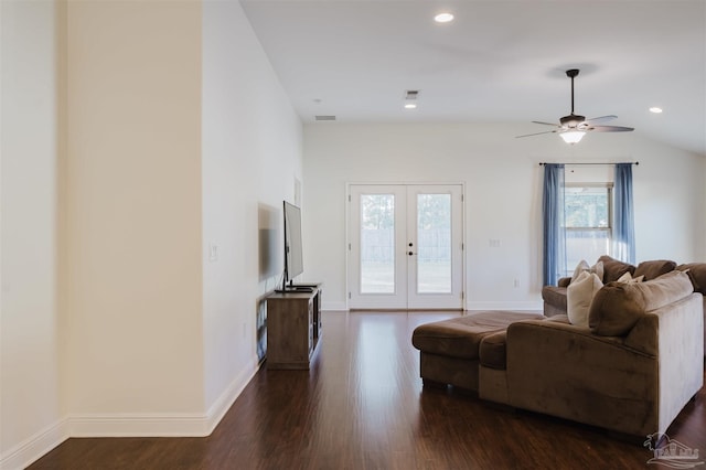 living room featuring lofted ceiling, ceiling fan, french doors, and dark hardwood / wood-style floors