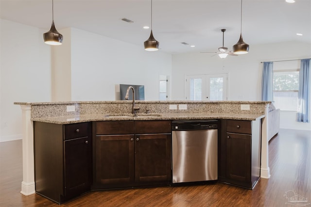 kitchen featuring dishwasher, dark brown cabinetry, sink, and dark wood-type flooring