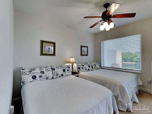 bedroom with carpet floors and ceiling fan