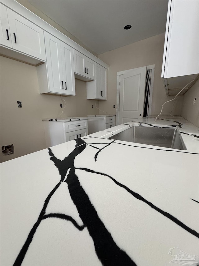 kitchen with white cabinetry